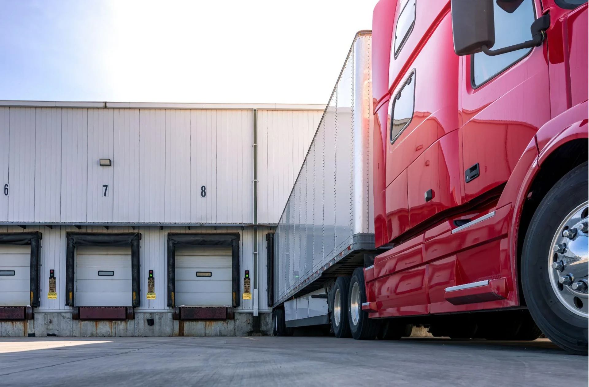 Freight truck at a warehouse loading bay