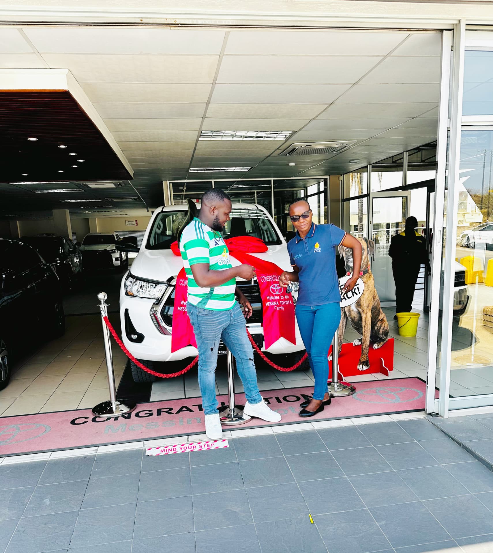 Customer at a new vehicle handover